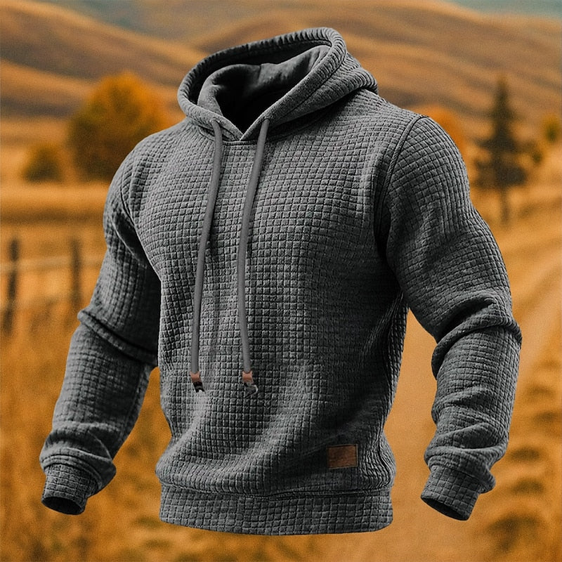 Waffle-Knit Pullover Hoodie – Dark gray waffle-knit hoodie with drawcords and ribbed cuffs