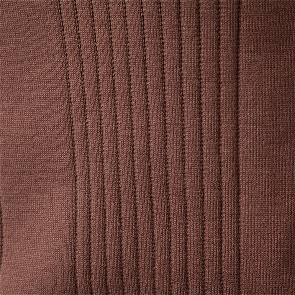 Close-up of a brown fine-gauge knit polo sweater featuring a vertical ribbed texture and soft, warm-touch fabric.