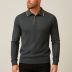 Charcoal long-sleeve polo sweater in fine-gauge ribbed knit with a tan contrast-trim collar and button placket.