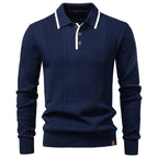 Navy blue long-sleeve polo sweater in fine-gauge vertical ribbed knit with a white contrast-trim collar and placket.