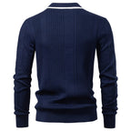 Navy blue long-sleeve polo sweater in fine-gauge vertical ribbed knit with a white-tipped contrast collar.