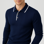 Navy blue long-sleeve polo sweater in fine-gauge vertical ribbed knit with a white contrast-trim collar and button placket.
