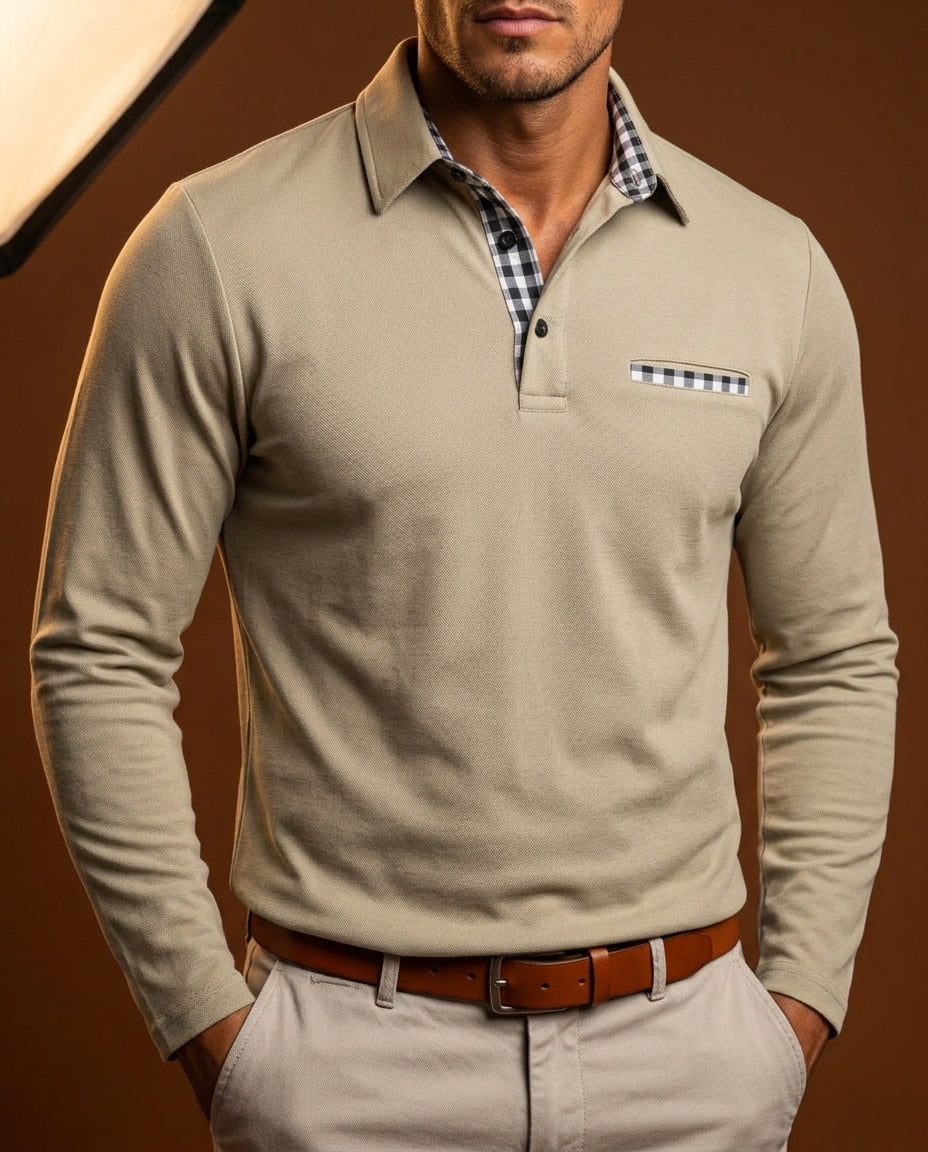 Tan long-sleeve pique polo featuring a black and white gingham placket and matching chest pocket trim.