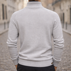 Light grey ribbed knit quarter-zip sweater with raglan sleeves and a slim-fit mock neck, viewed from the back.