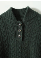 Dark green wool-blend cable-knit sweater featuring a button-up stand collar and ribbed neckline detail.