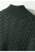 Dark green wool-blend cable-knit sweater featuring a ribbed stand-up collar and intricate braided texture.