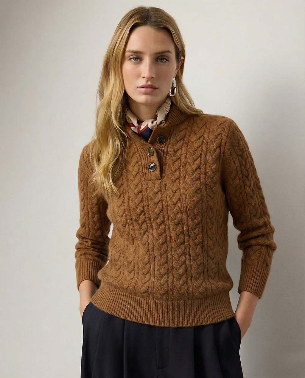 Brown wool-blend cable-knit sweater featuring a button-up stand collar and ribbed trim in a slim, tailored fit.