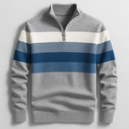 Grey cotton quarter-zip pullover featuring a blue and white color-blocked chest stripe and ribbed mock collar.