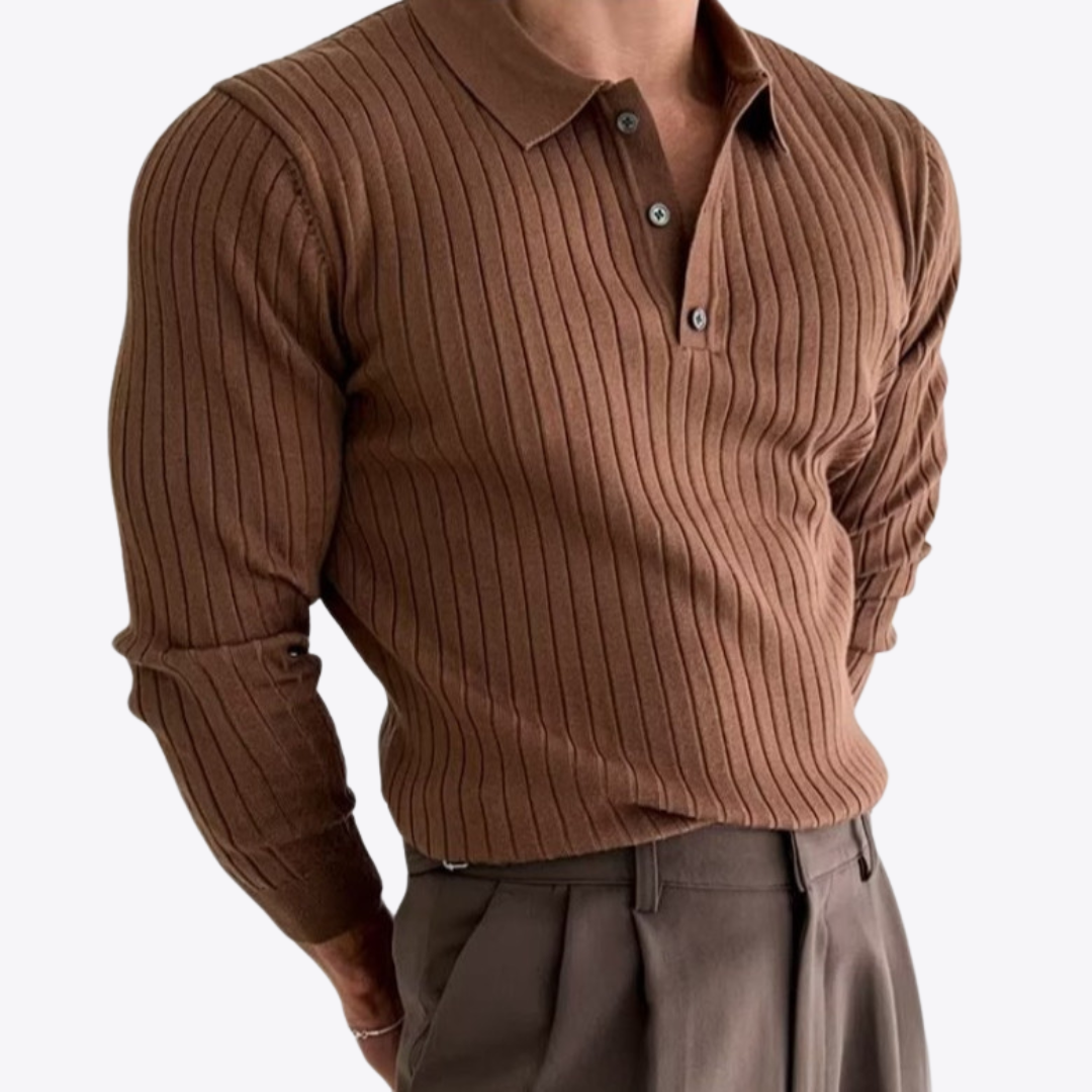 Brown long-sleeve polo sweater in vertical rib-knit with a lapel collar and button placket, worn with tailored trousers.