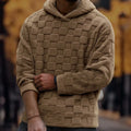 Raised Checkerboard Pullover Hoodie – Brown textured hoodie worn by a male model with ribbed cuffs and elastic waistband