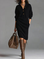 Black ribbed knit midi sweater dress with a button-down collar, long sleeves, and a relaxed, comfortable fit.