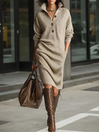Beige ribbed knit midi sweater dress with a button-down collar and long sleeves, styled with tall brown leather boots.