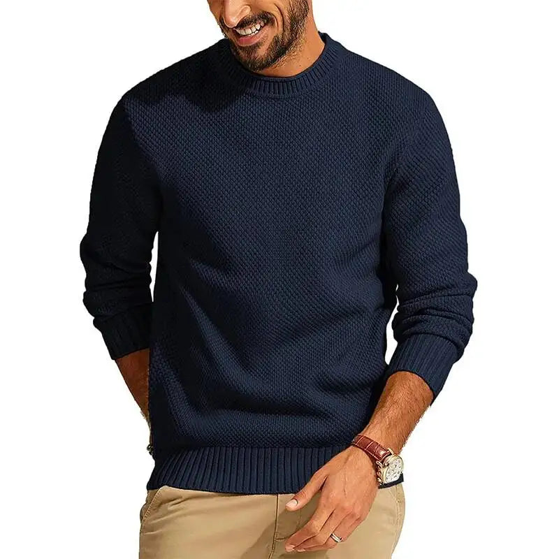 Navy blue waffle-knit crew neck sweater with ribbed cuffs and hem in a relaxed, comfortable fit.